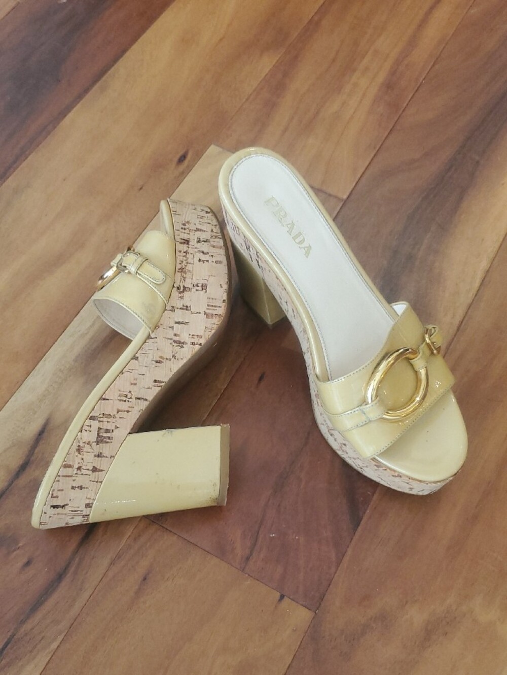 Prada Patent Leather Slide Mules in Pale Yellow with Gold Buckle